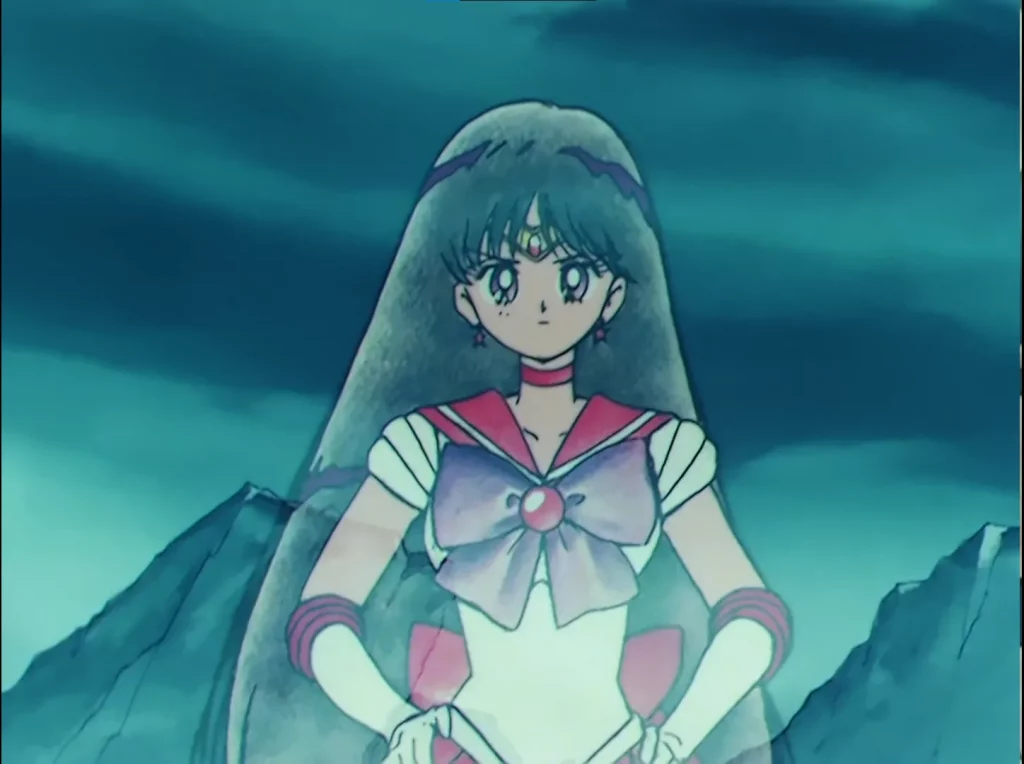 Sailor Mars' ghost cheering Sailor Moon on.